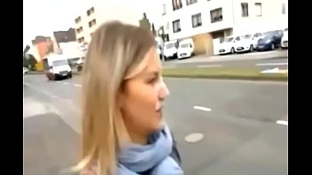 Exhibitionist woman with a facial cumshot on the street