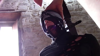 Laura XXX is tied up, nylon masked blindfolded. She has to deepthroat a cock with no mercy
