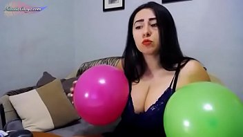 Busty Beauty Jumps On Balloons - Solo