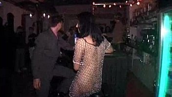 wild girl dancing nude at the bar