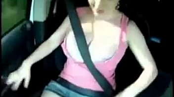 Showing Off Her Big Breasts During A Drive