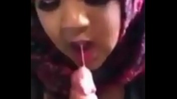 Muslim woman in hijab giving blowjob