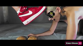 Disgusting kinky porn. The girl licks food from her shoes. Humiliation and Cumshot!