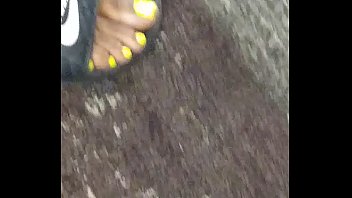 Ebony teen feet yellow toes nike slides faceshot