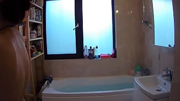 Emo teen shaving into the shower