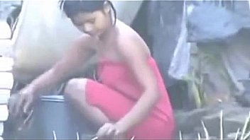 Indian hot village girl bathing outside,