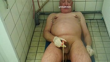 german grandpa jerking of with catheter in urethra