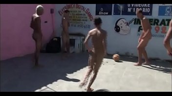 Nude men playing football at brazil