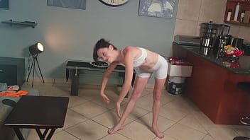 Flexible petite slut giving herself a mouth and piss facial