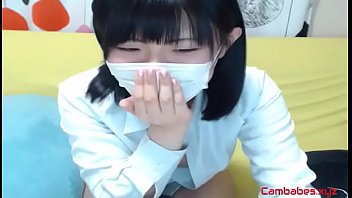 Japanese cutie teasing in non nude webcam show