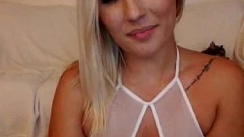 Blonde babe dildoing her pussy on webcam