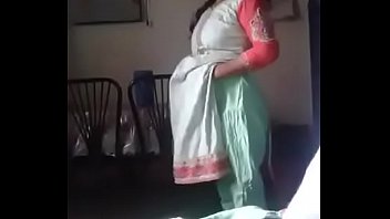 Clothed indian girl at home