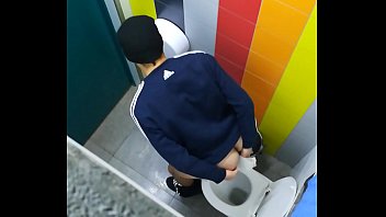 Jerking off in the public toilet