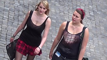 Busty, blonde candid teen walking down the street with bouncing boobs
