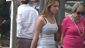 Busty beautiful teen walking down the street, candid tight top bouncing boobs