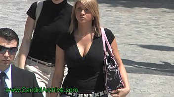 Busty candid blonde teen in black top, sexy cleavage bouncing boobs w slowmotion
