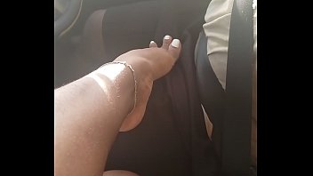 SEXY BIG FEET FOOTJOB IN CAR