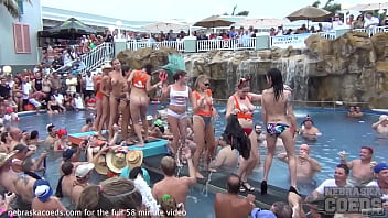 The pool at a nude swinger bar in key west, Florida, was nice and cool fantasy fest girls flashing tits and pussy in the pool